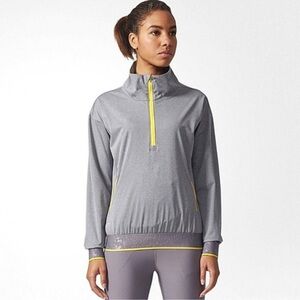 NWT Adidas Golf ClimaStorm 1/2 Zip
Windbreaker Jacket